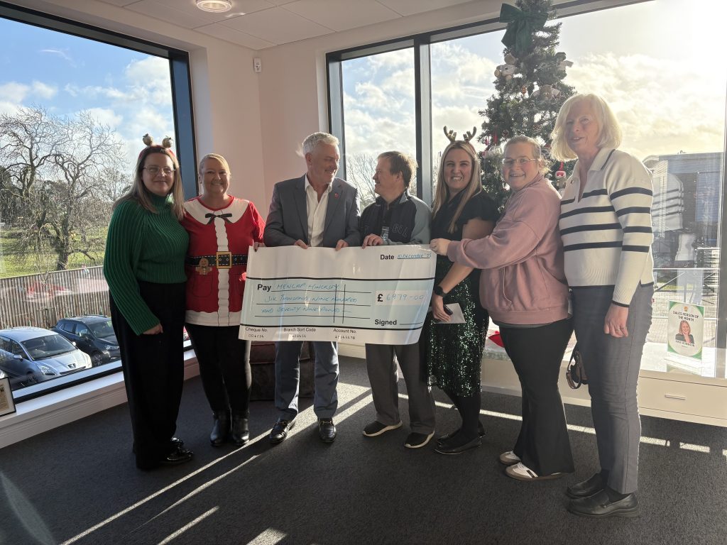 Geosynthetics Limited present cheque to Mencap Hinckley